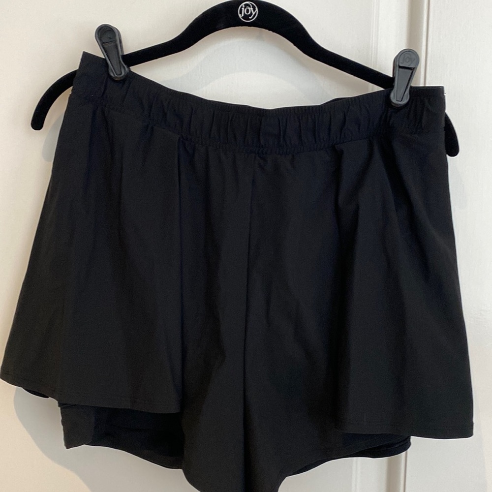 Lululemon skort.  Pockets on sides of built in short.